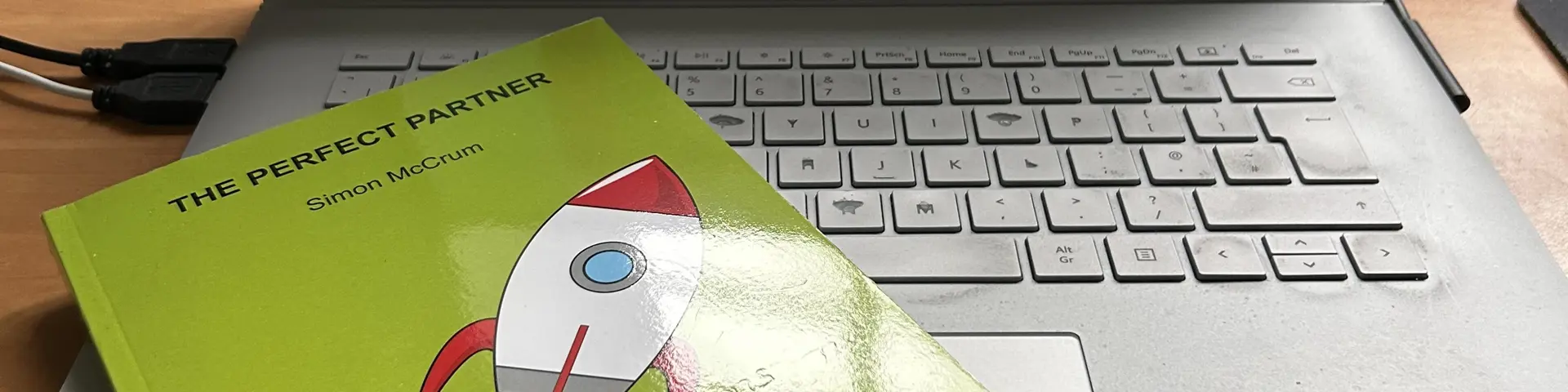 book cover, a simple rocket graphic on a green background book cover, a simple rocket graphic on a green background