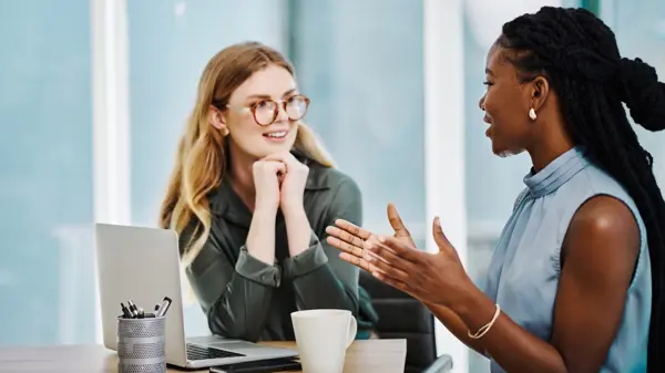 Two women deep in discussion